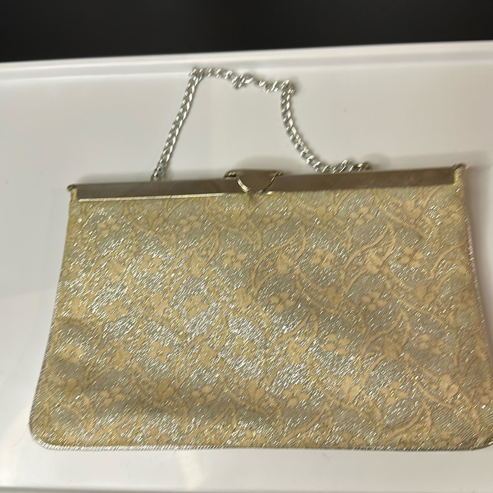 Hinged clutch with lace and silver sparkle detail